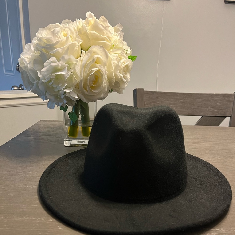 A red bottom fedora hat